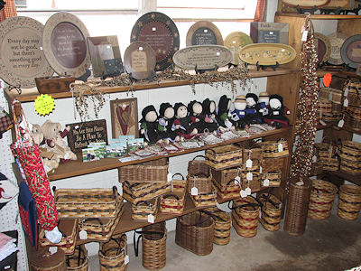 Handmade baskets and Amish dolls